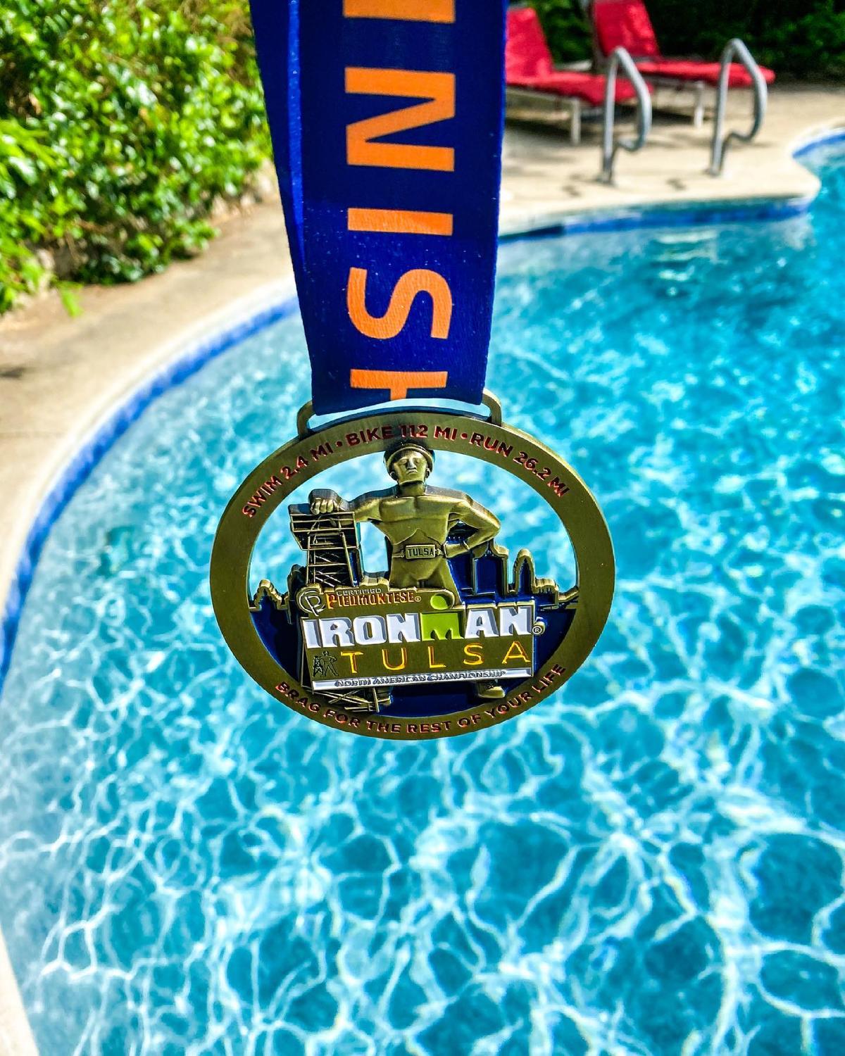 The medal Noel Mulkey received at the 2021 Tulsa Ironman Triathlon. (Courtesy of <a href="https://www.instagram.com/noelmulkey/">Noel Mulkey</a>)