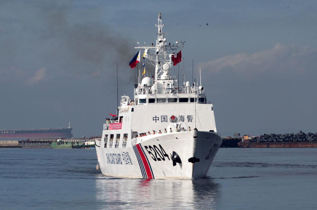 A Chinese Coast Guard ship prepares to anchor at Manila port for a port call on Jan. 14, 2020. (AFP via Getty Images)