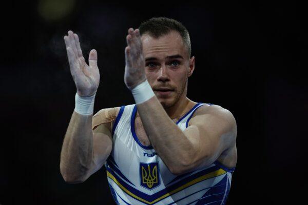 Ukraine's Oleg Verniaiev reacts after performing on the rings during the mens all-around final at the FIG Artistic Gymnastics World Championships at the Hanns-Martin-Schleyer-Halle in Stuttgart, southern Germany, on Oct. 11, 2019. (Lionel Bonaventure/AFP via Getty Images)