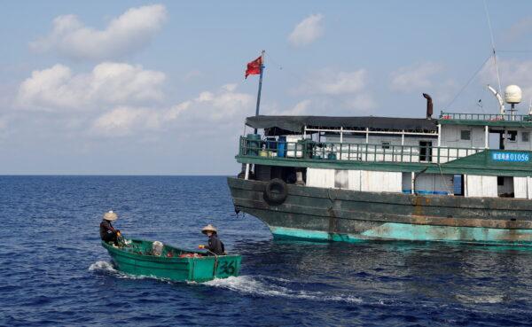 Chinese fishermen head to fish at the disputed Scarborough Shoal, on April 6, 2017. (Erik De Castro/File Photo/Reuters)