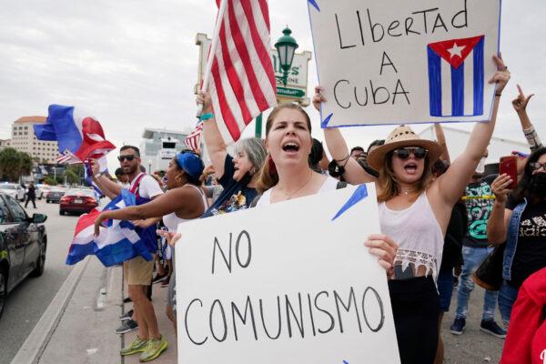 Cuban exiles rally in support of protesters in Cuba at Versailles Restaurant in Miami's Little Havana neighborhood on July 12, 2021. (Marta Lavandier/AP Photo)