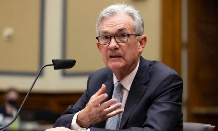 Powell Says Inflation, Though Elevated, Will Likely Moderate