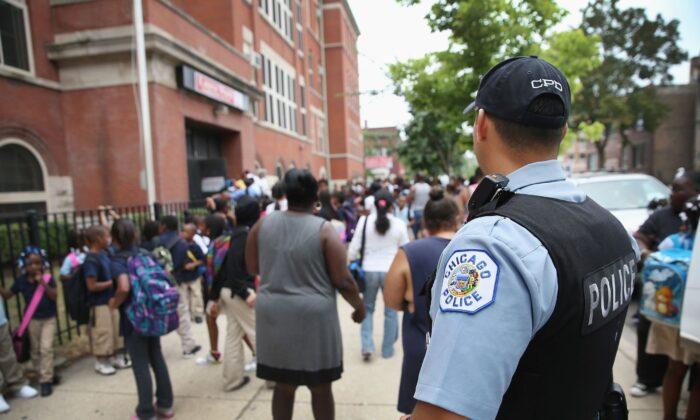 Defying Teachers, Schools in Violent Chicago Neighborhoods Keep Police on Campus