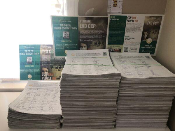 The Global Service Centre for Quitting the Chinese Communist Party initiated the 'End CCP' petition in September 2020. Volunteers have collected roughly 70,000 signatures in Calgary alone. (Wenwen Guo)