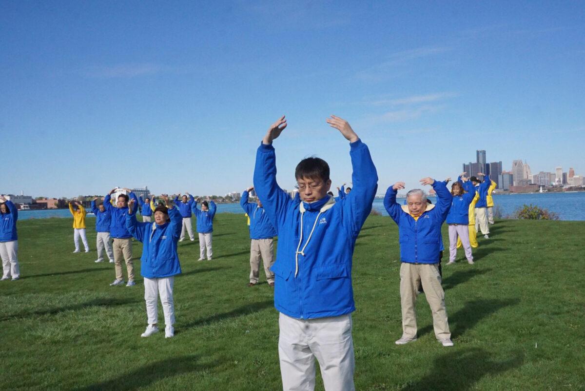Wang Weiyu practices Falun Gong exercises in a public park in Michigan in May 2021. (Courtesy of Wang Weiyu)