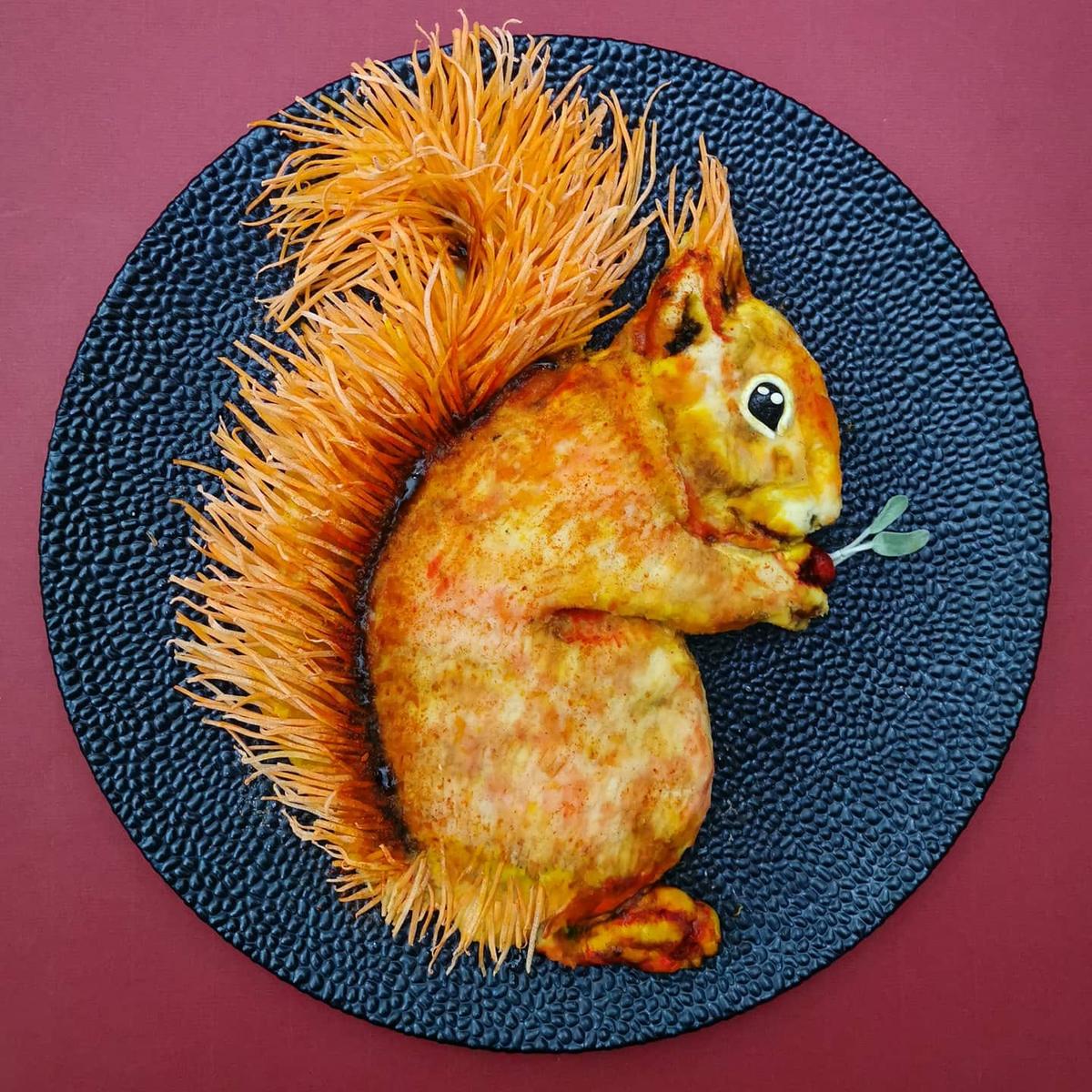 "Carrot Stew Squirrel" made of carrots, potatoes, onions, and a green apple.  (Courtesy of <a href="https://www.instagram.com/demealprepper/">Jolanda Stokkermans</a>)