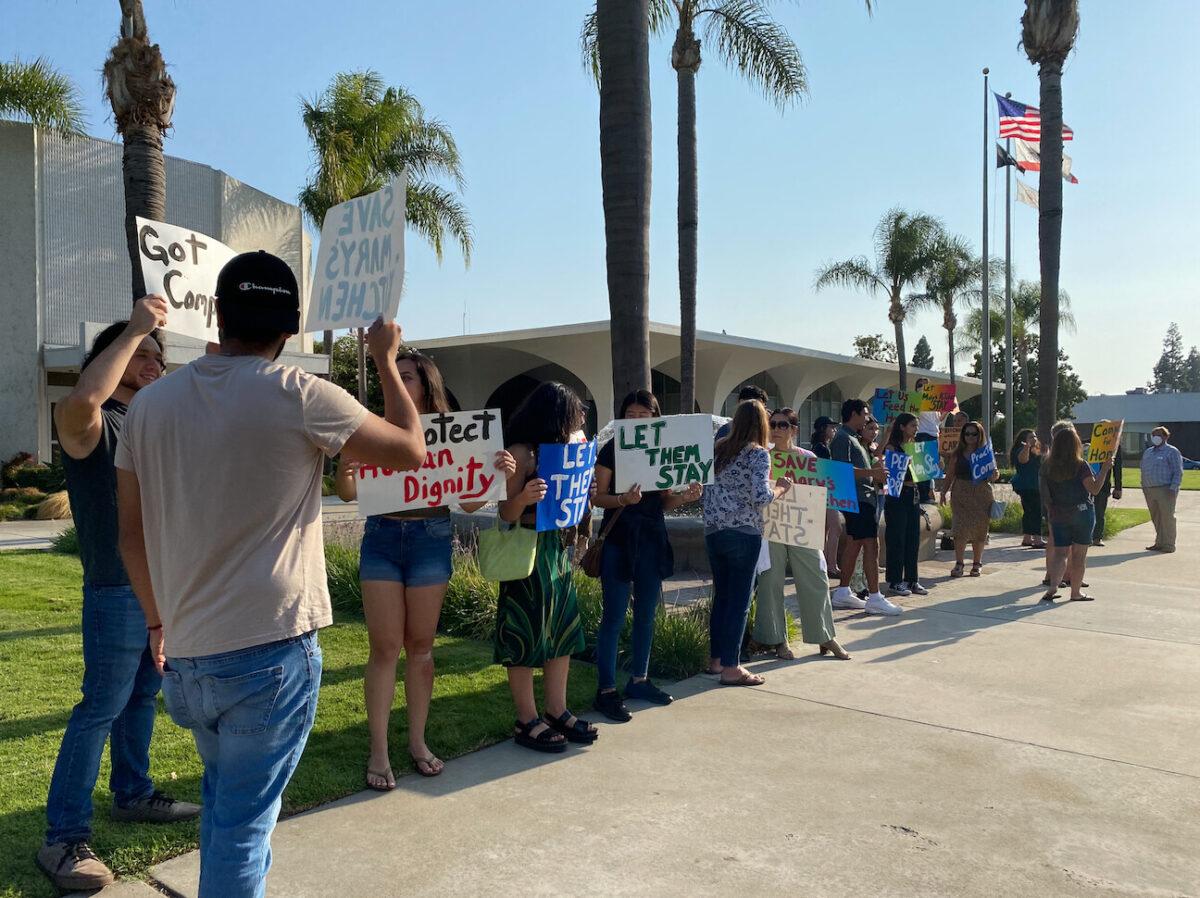 Community members protest the city of Orange's decision to shut down Mary's Kitchen, a soup kitchen for the homeless, in Orange, Calif., on July 13, 2021. (Chris Karr/The Epoch Times)