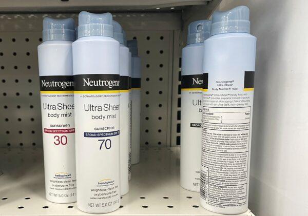 Johnson’s Neutrogena Ultra Sheer sunscreen, which is part of a voluntary recall of five Neutrogena and Aveeno brand aerosol sunscreen products after a cancer-causing chemical was detected in some samples, sits on a shelf at a store in Gloucester, Mass., on July 15, 2021. (Brian Snyder/Reuters)