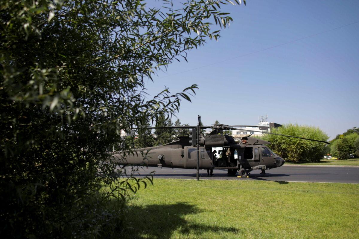A military Black Hawk helicopter made an emergency landing in central Bucharest, Romania, on July 15, 2021. (Inquam Photos/Octav Ganea via Reuters)
