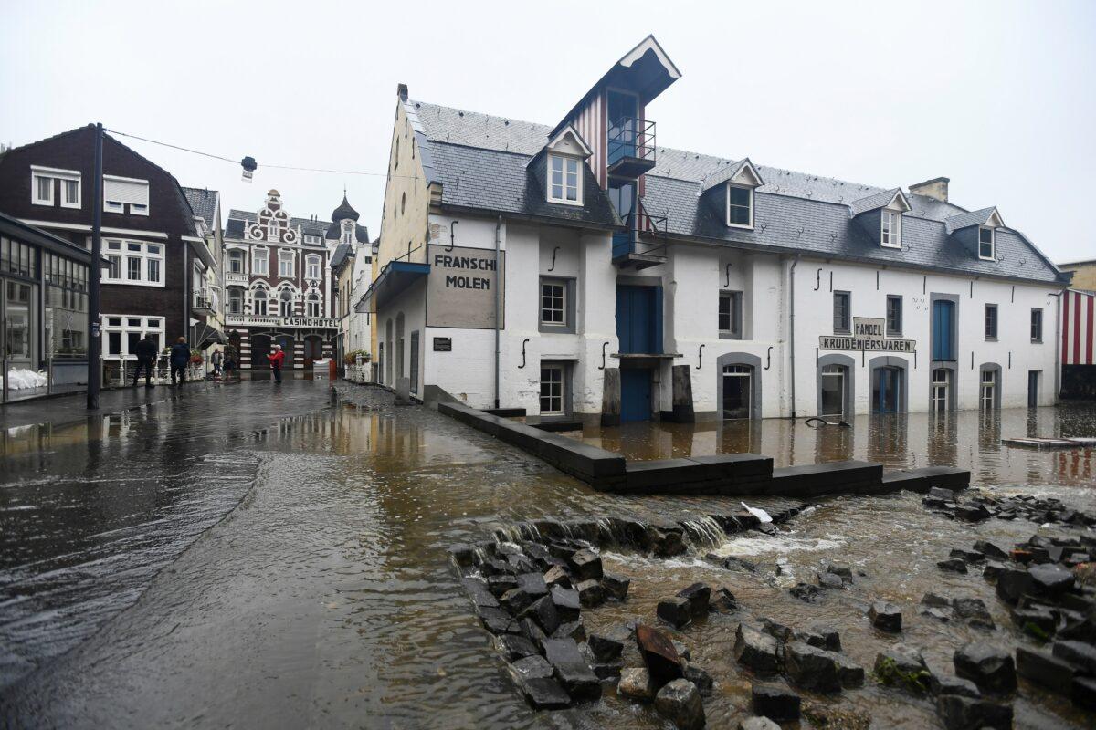 A flooded street is seen following heavy rainfalls in Valkenburg, Netherlands, on July 15, 2021. (Piroschka Van De Wouw/Reuters)