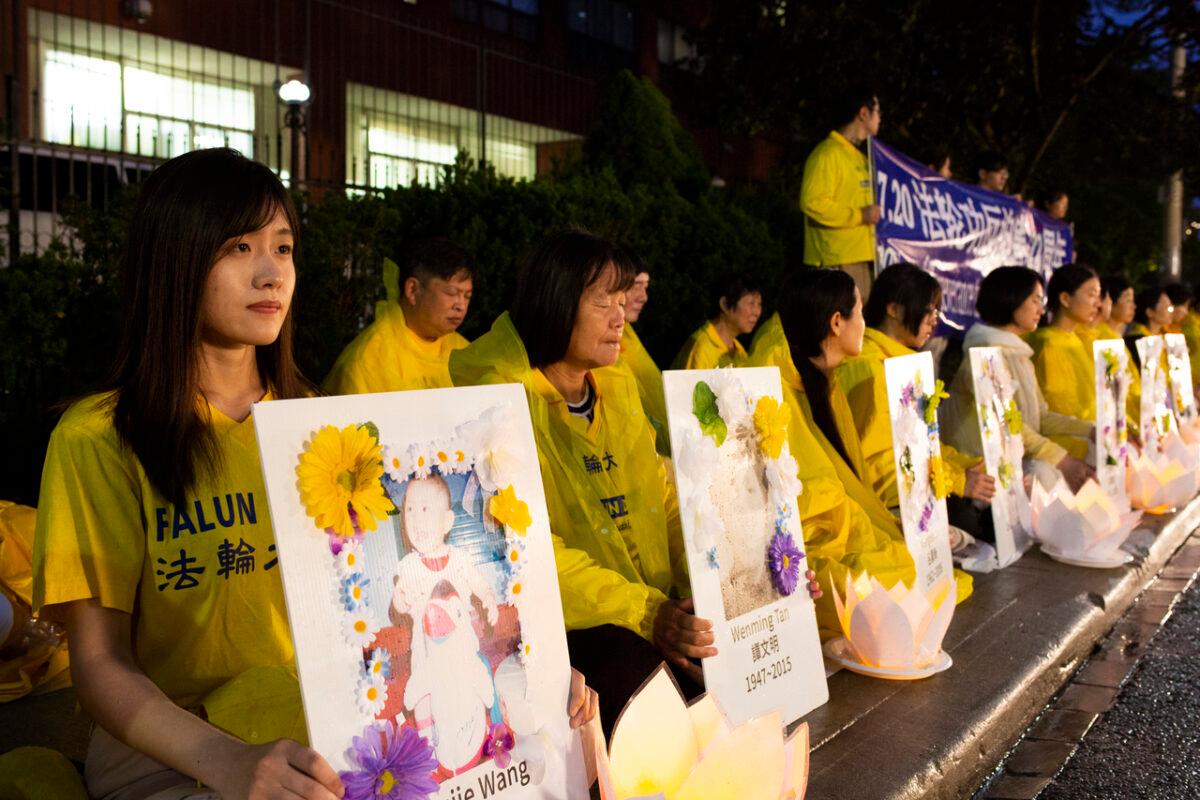 Falun Gong adherents attend a candlelight vigil in front of the Chinese Consulate in Toronto, marking 22 years of persecution by the Chinese communist regime and calling on the regime to end its persecution of the spiritual practice in China, on July 15, 2021. (Evan Ning/The Epoch Times)