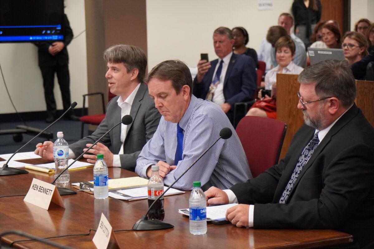 (L-R) Doug Logan, CEO of Cyber Ninjas, the firm leading Arizona's vote audit in Maricopa County, gives testimony on preliminary findings at a Senate hearing, sitting beside Arizona Senate audit liaison Ken Bennett, and Ben Cotton, the founder of a digital security firm called CyFIR LLC, in Phoenix,  on July 16, 2021. (Allan Stein/Epoch Times)