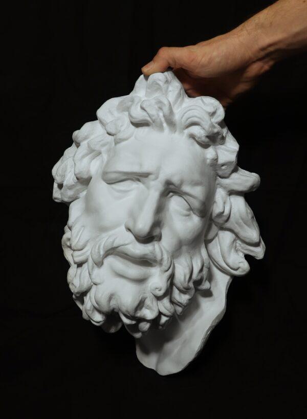 Plaster cast mask of Laocoön from the sculptural group "Laocoön and His Sons" by Agesander, Polydorus, and Athenodorus; 16 inches by 11 inches. (Courtesy of Justin Ryan Kendall)
