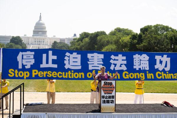Faith McDonnell, director of Advocacy Katartismos Globa, speaks at a rally marking the 22nd anniversary of the start of the Chinese regime's persecution of Falun Gong, on the National Mall in Washington on July 16, 2021. (Larry Dye/The Epoch Times)