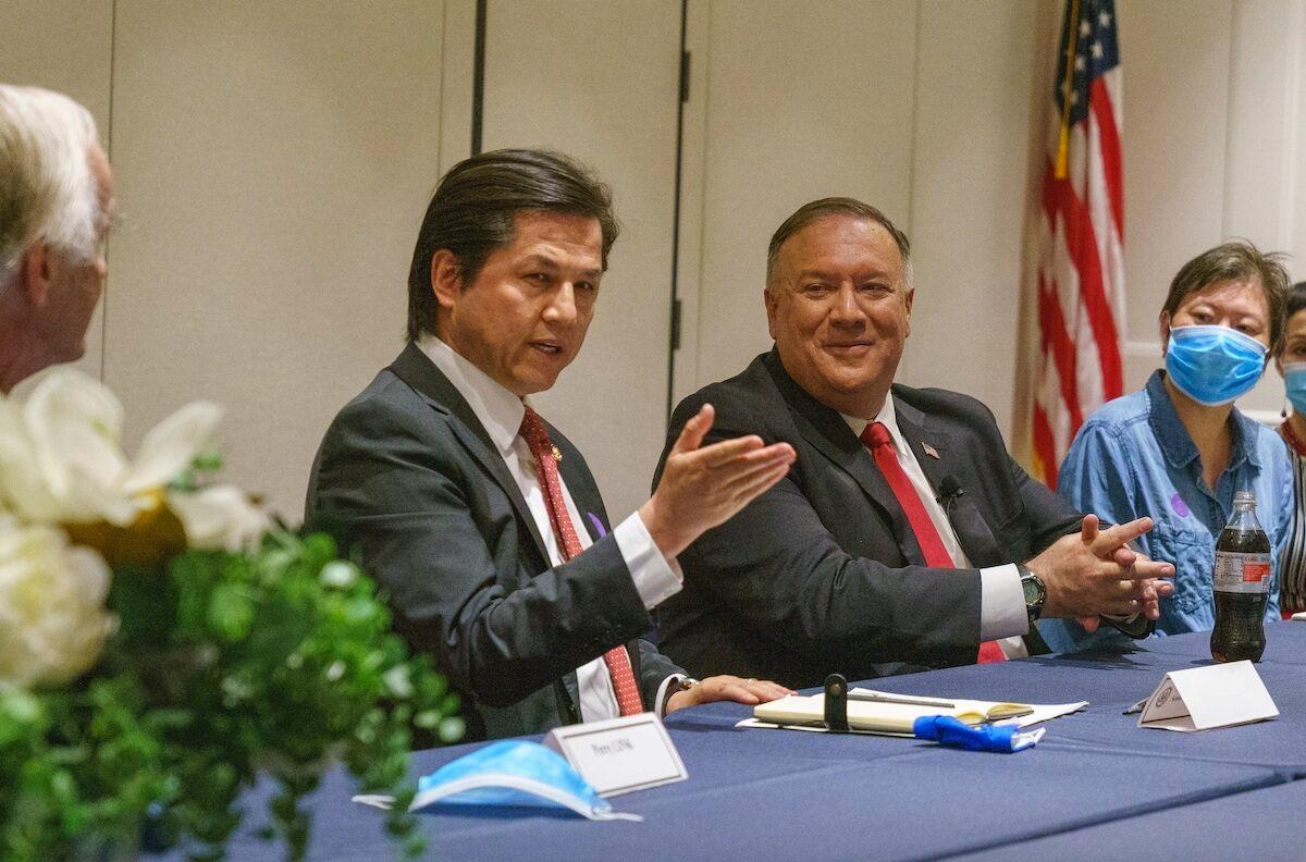 A file image of Nury Turkel, vice-chair of the U.S. Commission on International Religious Freedom, meeting with then-U.S. Secretary of State Michael Pompeo and Chinese dissidents in Washington on July 2020. (Ron Przysucha/U.S. State Department)