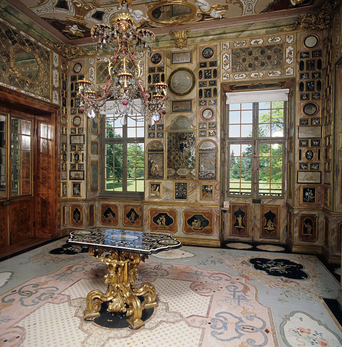 <span style="font-weight: 400;">The Florentine cabinet is the most famou</span><span style="font-weight: 400;">s room of the palac</span><span style="font-weight: 400;">e and features pietra dura (Italian for “hard stone”) panels, precious lapidary artwork from Florence. They are from the Cosimo III de’ Medici factory in Tuscany, Italy. Paper-thin plates made of marble, granite, and semiprecious stone were formed into 758 panels of bright illustrations. </span> (Hecker/Rastatt Favorite)