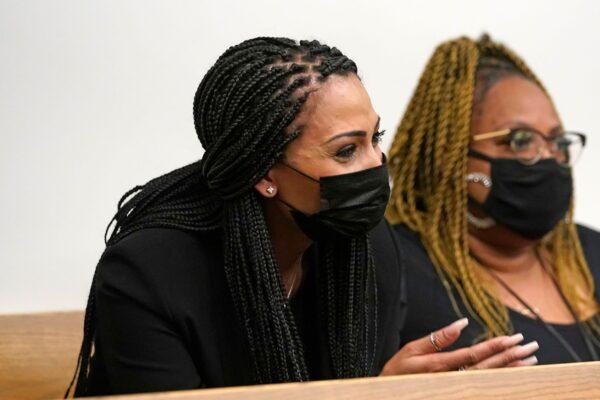 Ashley Sherman (L), wife of free agent NFL football player Richard Sherman, sits with another woman during a hearing about her husband at King County District Court, in Seattle, Wash., on July 15, 2021. (Elaine Thompson/AP Photo)