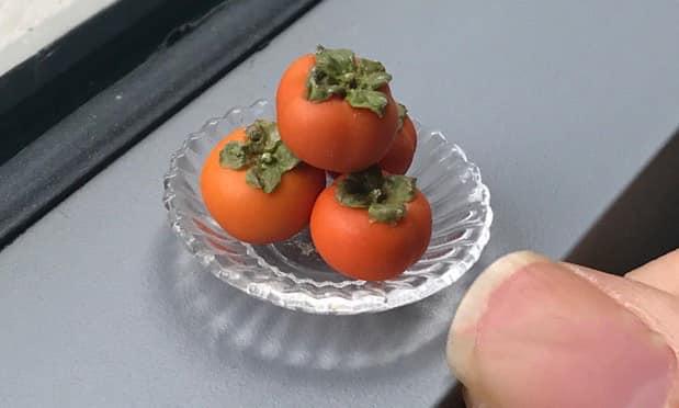 Miniature clay persimmons. (Courtesy of <a href="https://www.facebook.com/quynh.pe.963">Nhu Quynh Nguyen</a> and <a href="https://www.facebook.com/groups/groupyeubep/permalink/1422297744821043/">Esheep Kitchen family</a>)