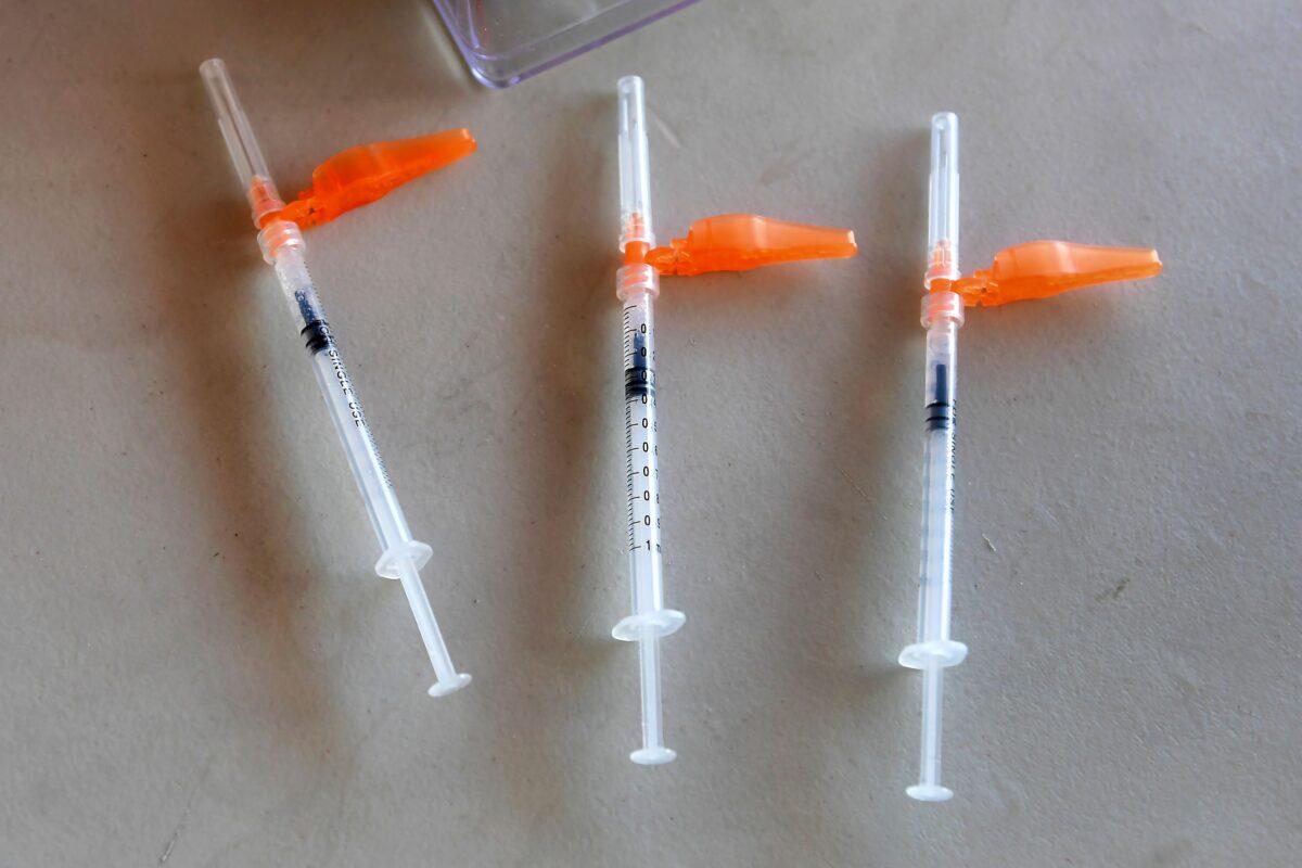 Syringes with the Pfizer COVID-19 vaccine are pictured ready for use at a mobile clinic in Los Angeles, on July 9, 2021. (Frederic J. Brown/AFP via Getty Images)