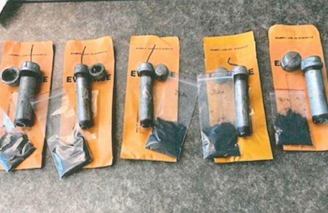 Five pipe bombs seized from the home of Ian Benjamin Rogers in Napa, Calif., are pictured in a file photograph. (FBI)