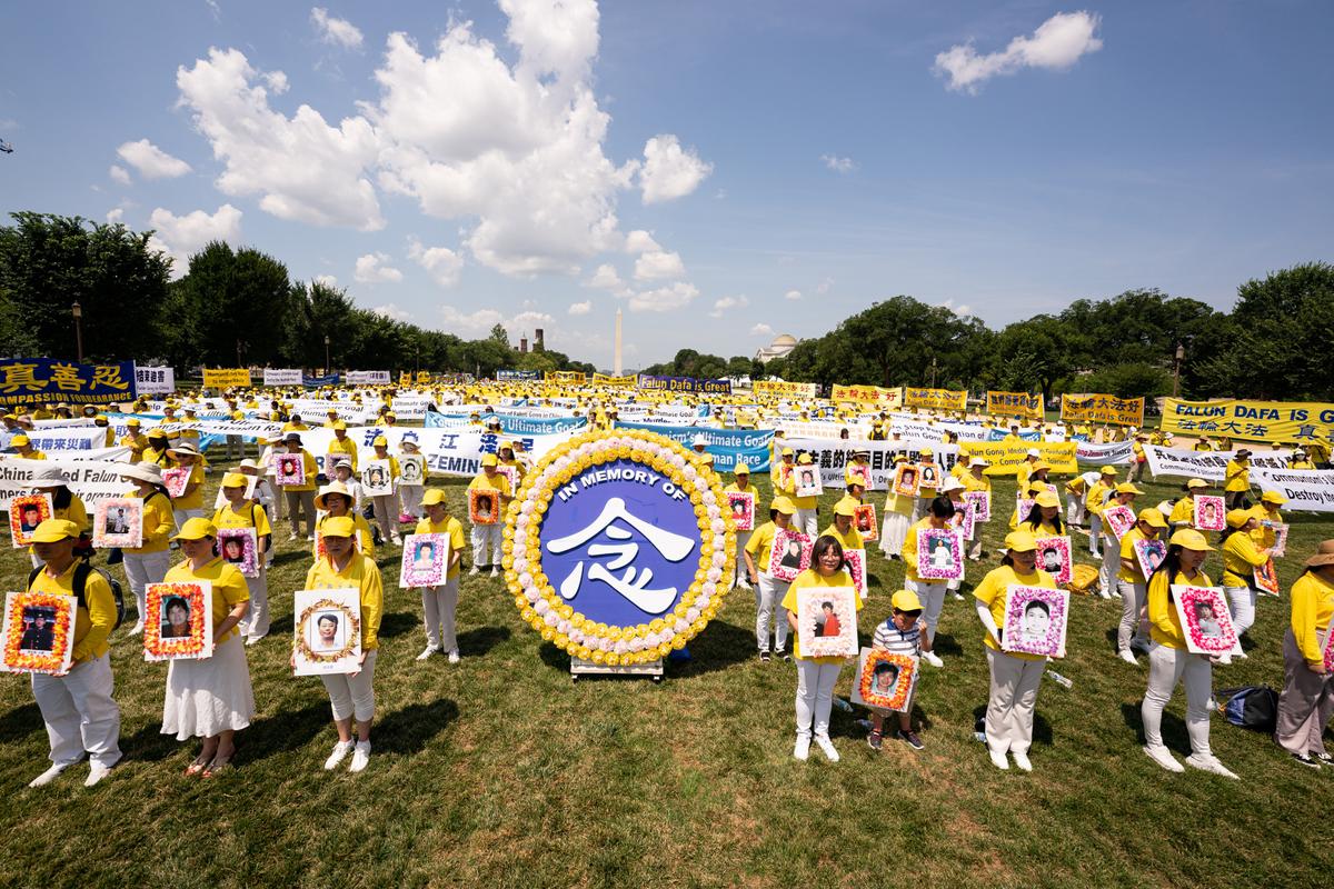 Falun Gong practitioners gather in Washington to mark the 22nd year of the persecution in China, on July 16, 2021. (Larry Dye/The Epoch Times)