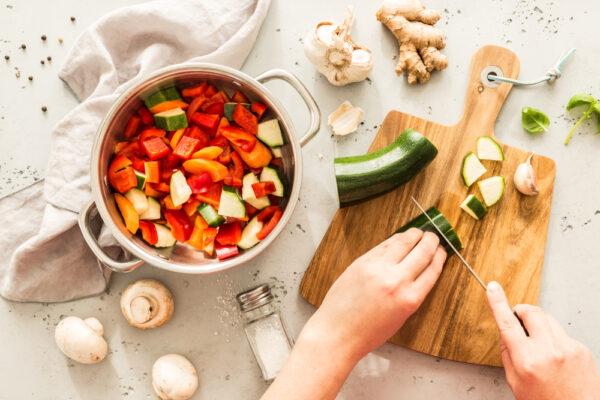 Cooking and baking using raw ingredients rather than those that are highly processed or prepared is one of the most effective ways to slash food costs. (Pinkyone/Shutterstock)