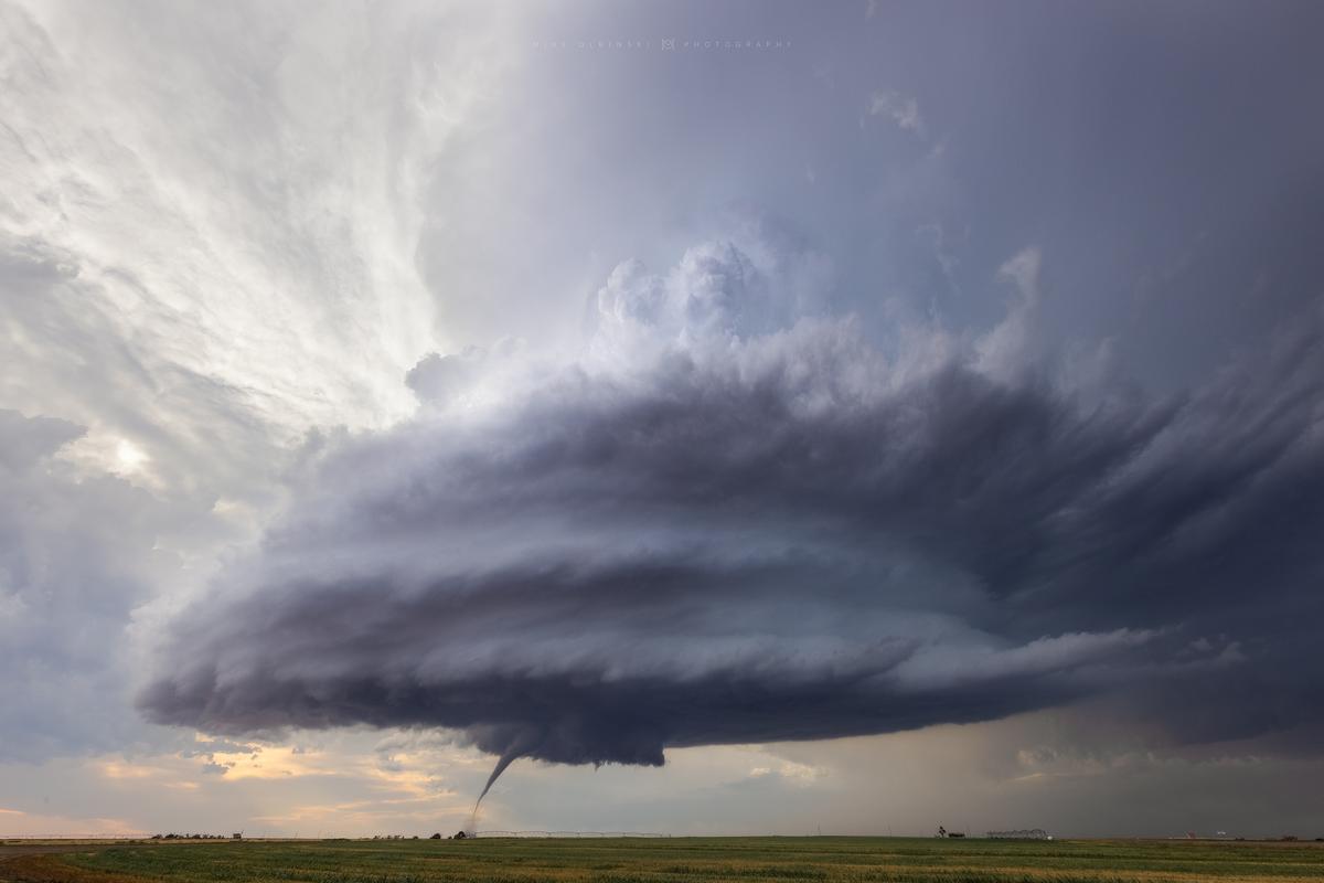 A stunning, structured supercell drops a tornado beneath it near the town of Sudan, Texas. (Courtesy of <a href="https://www.instagram.com/mikeolbinski/">Mike Olbinski</a>)
