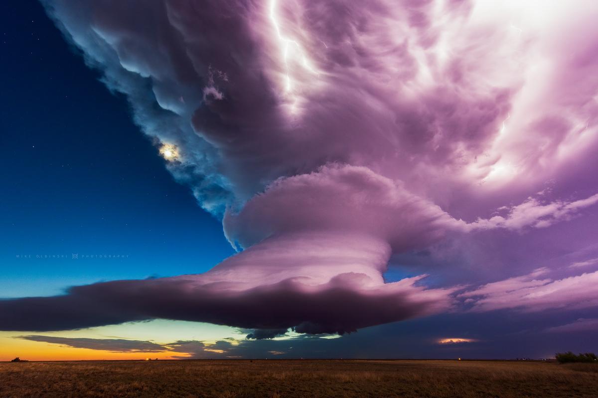 A stunning supercell moves over the wheat fields and plains near Cotton Center, Texas, just after sunset. (Courtesy of <a href="https://www.instagram.com/mikeolbinski/">Mike Olbinski</a>)