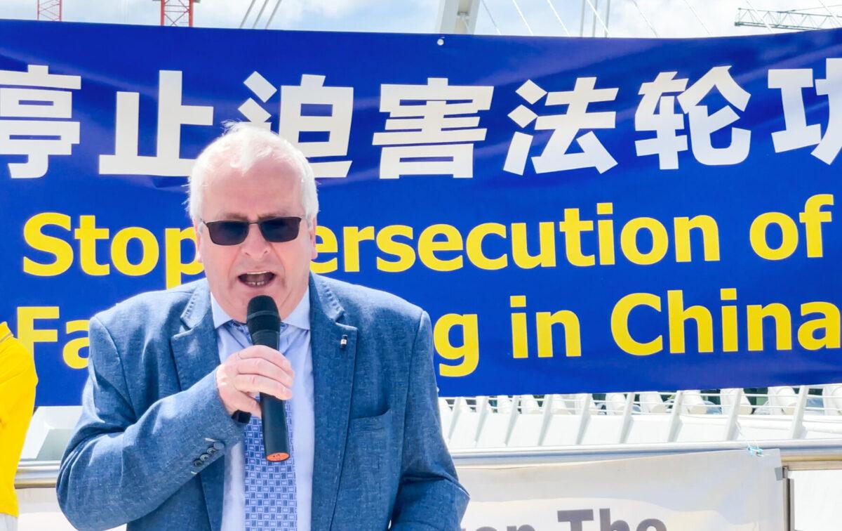 Mattie McGrath, independent TD, speaks at a rally that marks the 22nd year of the persecution in China, in Dublin, Ireland, on July 13, 2021. (Feng Yu/The Epoch Times)