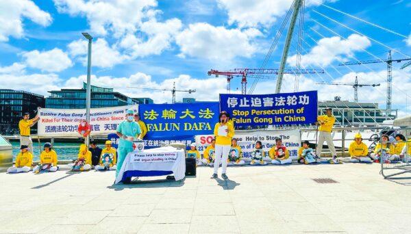 Falun Gong practitioners gather in Ireland to mark the 22nd year of the persecution of their faith in China, in Dublin, Ireland, on July 14, 2021. (Feng Yu/The Epoch Times)