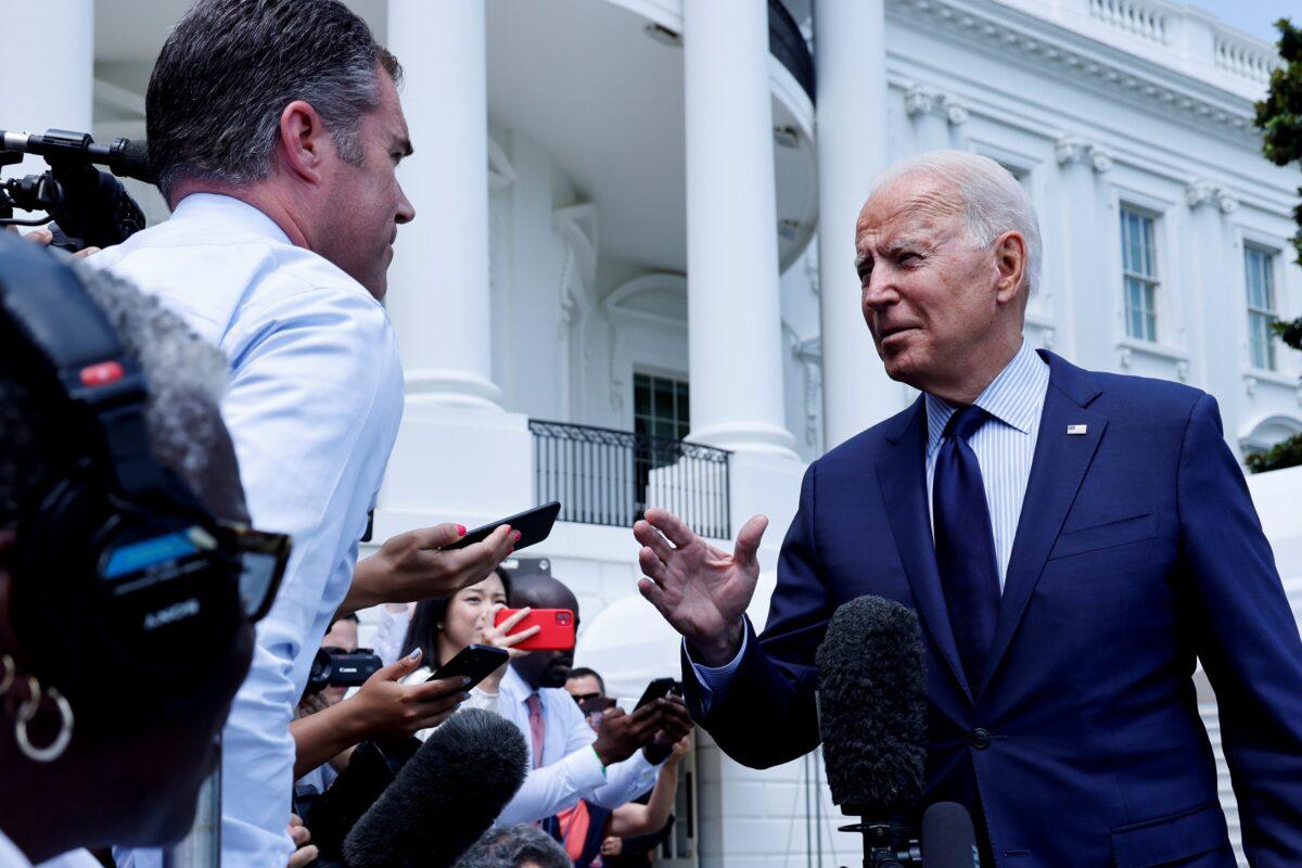 President Joe Biden talks to the media as he departs for a weekend visit to Camp David from the White House in Washington on July 16, 2021. (Jonathan Ernst/Reuters)
