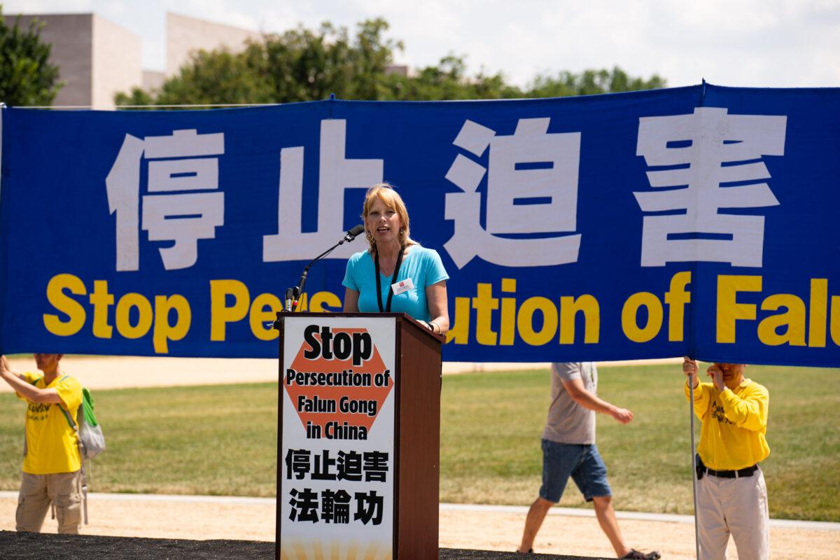 Dede Laugesen, executive director of the Save the Persecuted Christians, speaks at a rally that marks the 22nd year of the persecution in China, in Washington on July 16, 2021. (Larry Dye/The Epoch Times)