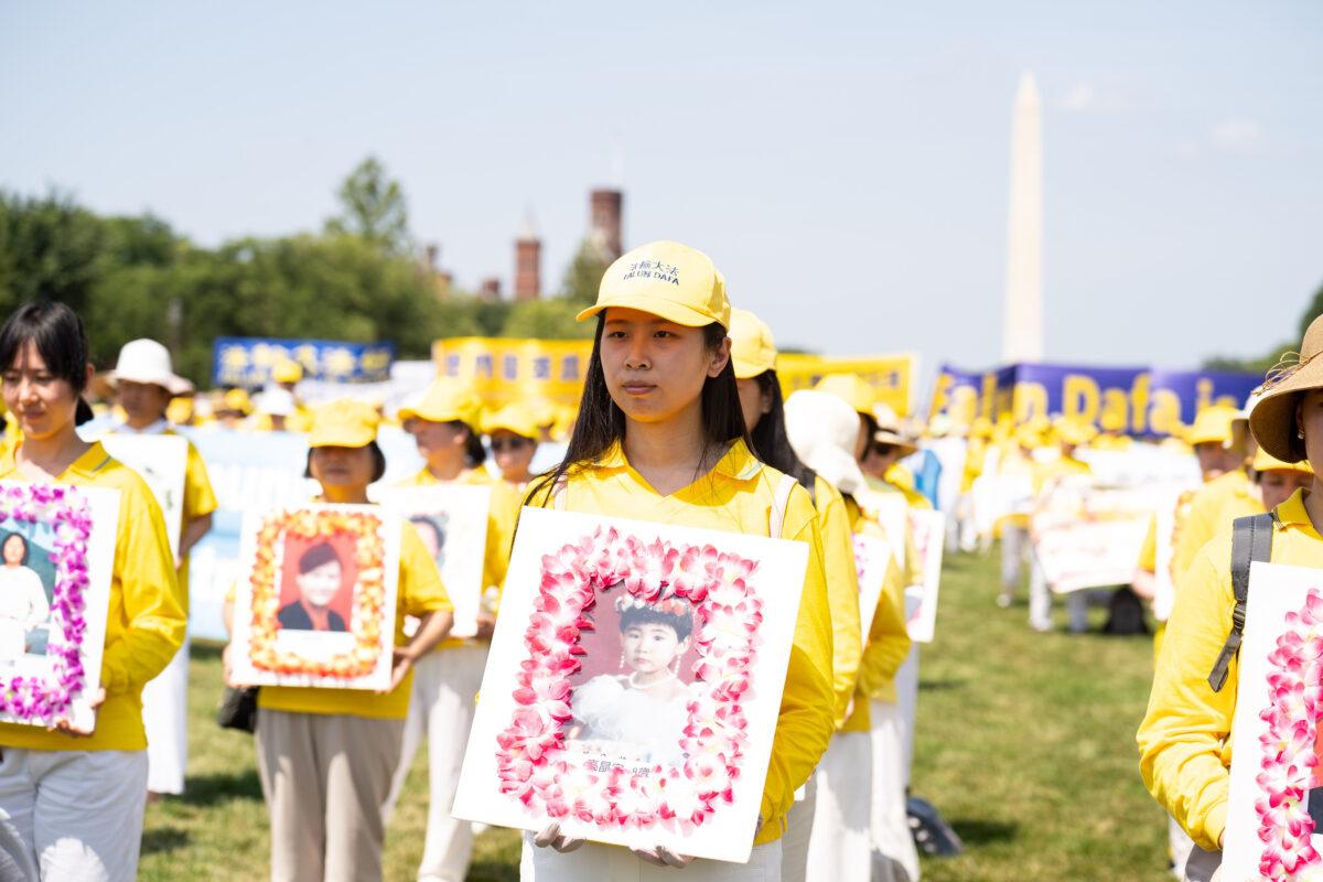 Falun Gong practitioners gather in Washington to mark the 22nd year of the persecution in China, on July 16, 2021. (Larry Dye/The Epoch Times)