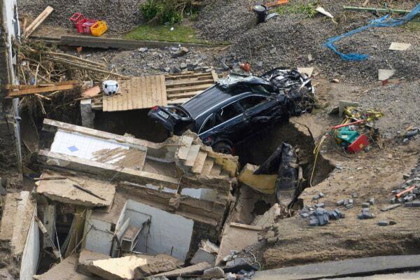 Houses and cars in the Ahr valley in the Walporzheim district are destroyed in Bad Neuenahr-Ahrweiler, Germany, on July 17, 2021. (Thomas Frey/dpa via AP)