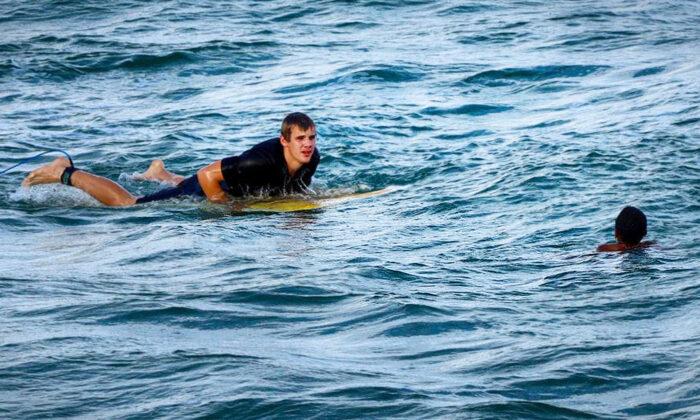 11-Year-Old Boy Caught in Riptide, Drowning, When Surfer Paddles to the Rescue, Saves His Life