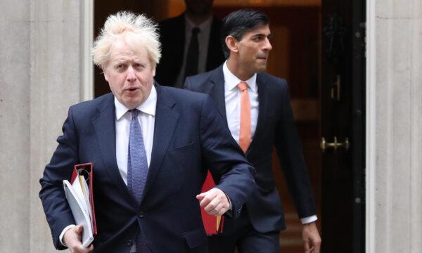 Prime Minister Boris Johnson (L) and Chancellor of the Exchequer Rishi Sunak on Oct. 13, 2020. (Jonathan Brady/PA)