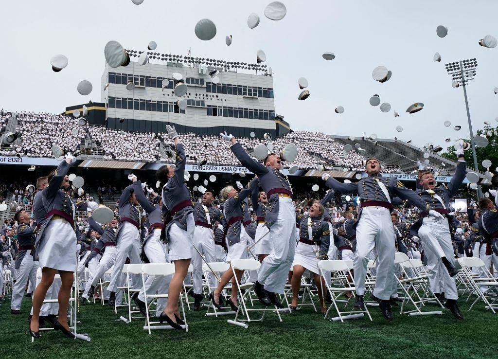 The Class of 2021 tossed their hats into the air after they graduated at the U.S. Military Academy's graduation ceremony at Michie Stadium West Point, New York, on May 22,2021. (Timothy A. Clary/AFP via Getty Images)