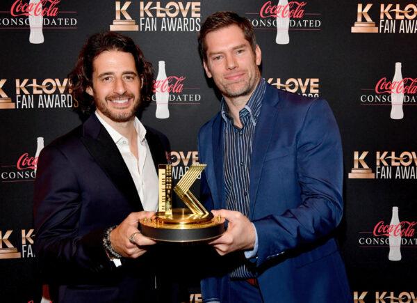 Jonathan Roumie and Dallas Jenkins take a photo back stage for winning the Film and Television Impact award during the 2021 K-LOVE Fan Awards in Nashville, Tennessee, on May 30, 2021. (Jason Davis/Getty Images for K-LOVE Fan Awards)