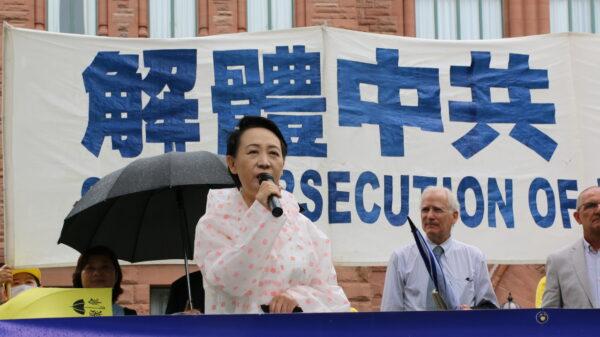 Sheng Xue, co-founder of the China Rights Network, at the rally in Queen's Park, Toronto, on July 17, 2021, condemning the CCP's 22-year persecution of Falun Gong practitioners. (Andrew Chen/The Epoch Times)