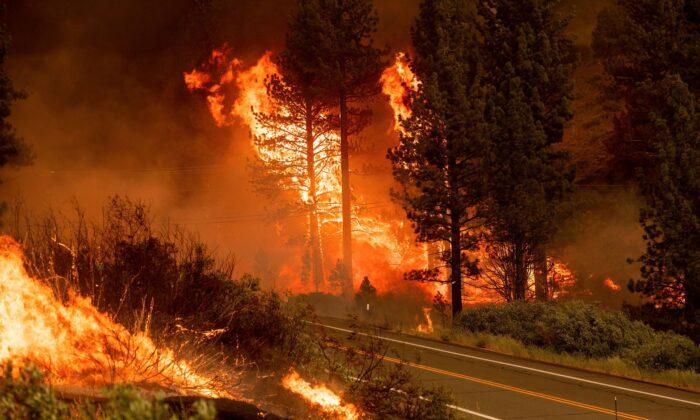 California Fire Prompts Evacuations; Oregon Blaze Balloons