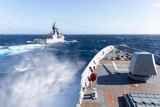 HMAS Brisbane sails alongside HMAS Parramatta during a replenishment at sea approach, off the coast of Queensland, during Exercise Talisman Sabre 2021. Exercise Talisman Sabre 2021 (TS21) is the largest bilateral training activity between Australia and the United States, commencing on 14 July 2021. (Supplied: Australian Department of Defence)
