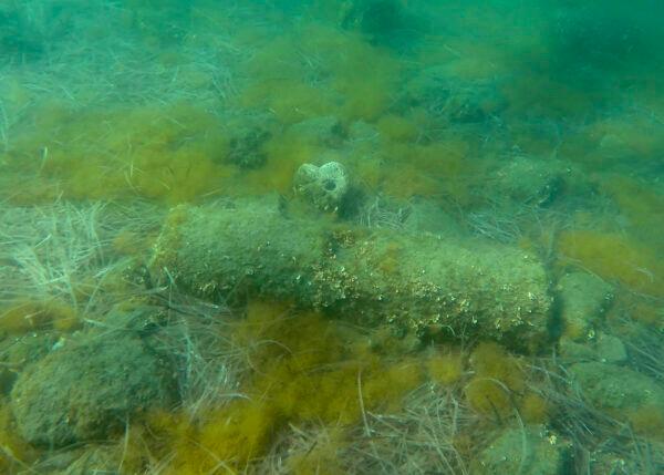 A submerged stone remain of the ancient harbor next of Amathus ancient city, in the eastern Mediterranean island of Cyprus, on July 1, 2021. (Petros Karadjias/AP Photo)