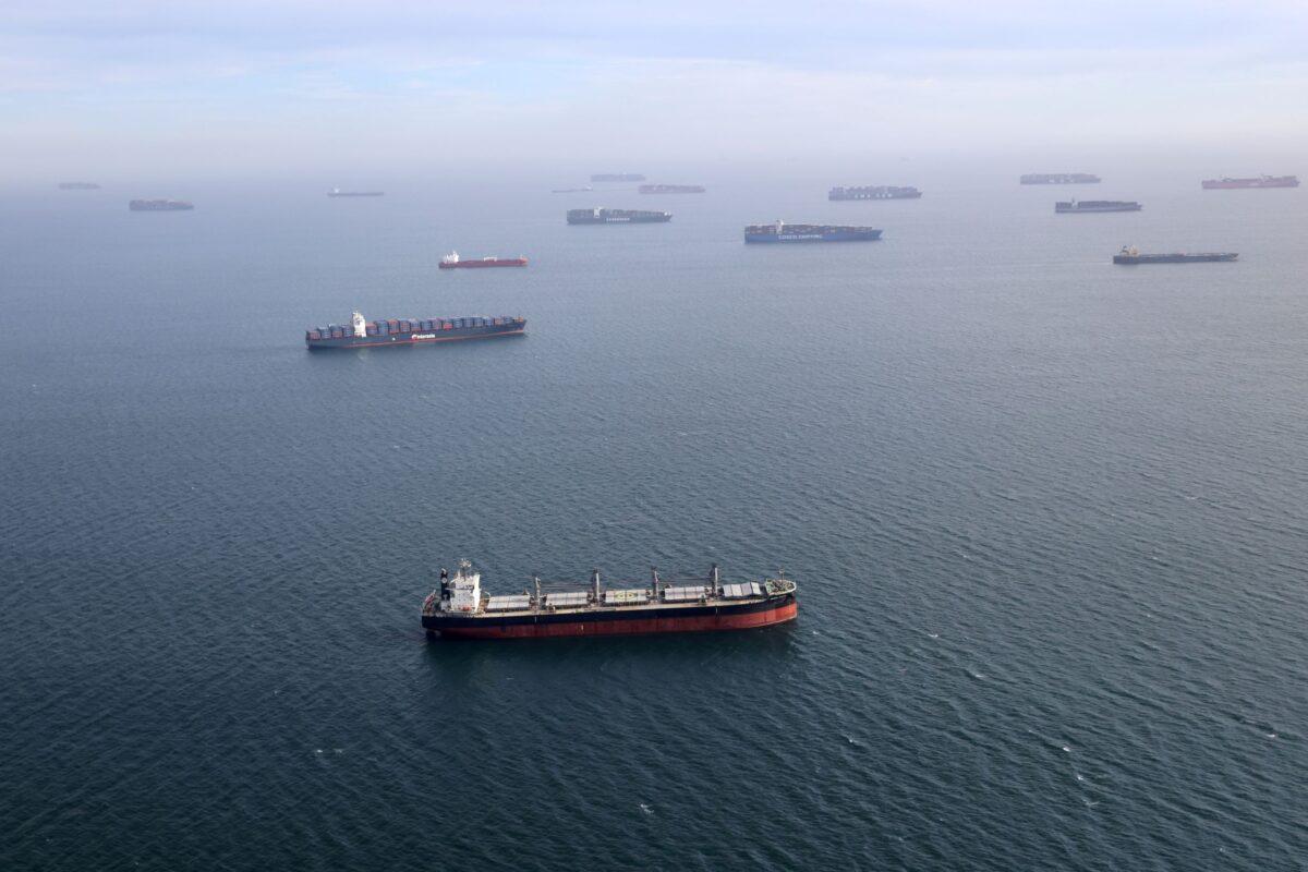 Container ships and oil tankers wait in the ocean outside the Port of Long Beach-Port of Los Angeles complex in Los Angeles on April 7, 2021. (Lucy Nicholson/File/Reuters)