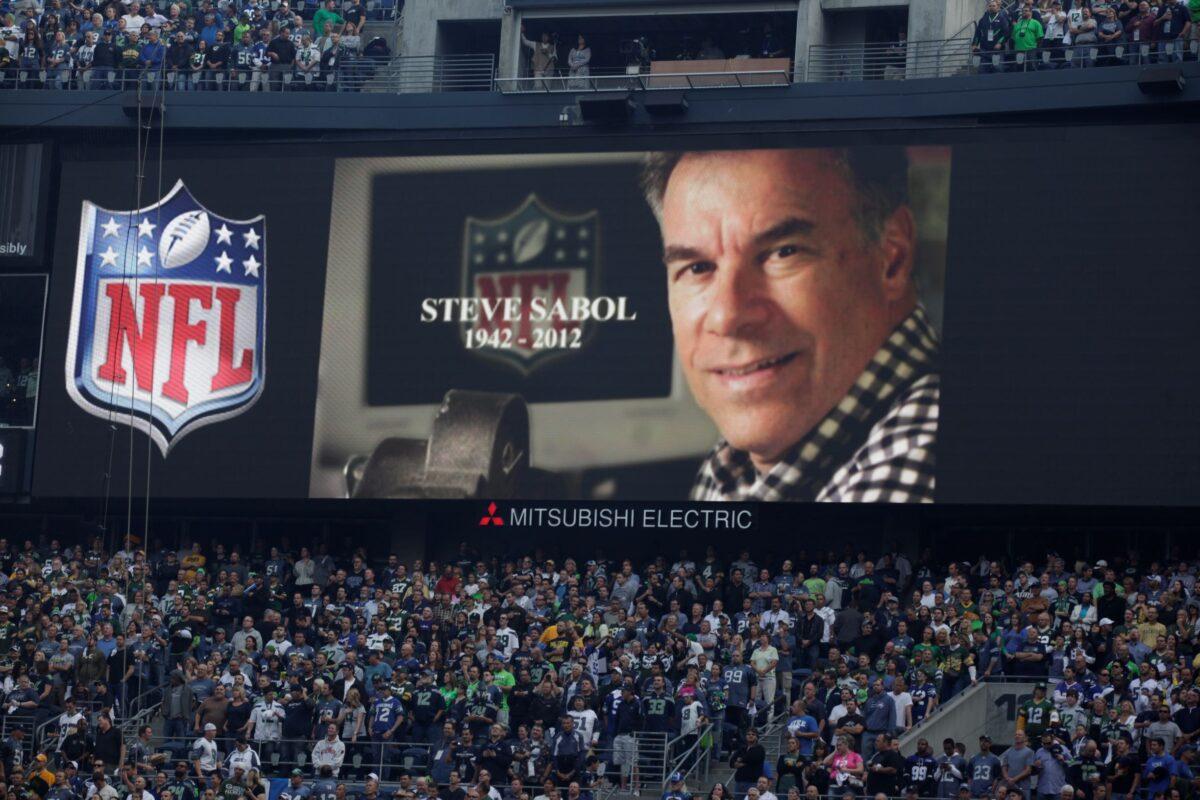 A tribute to NFL Films' Steve Sabol is shown during an NFL football game in Seattle, Wash., on Sept. 24, 2012. (Ted S. Warren/AP Photo)