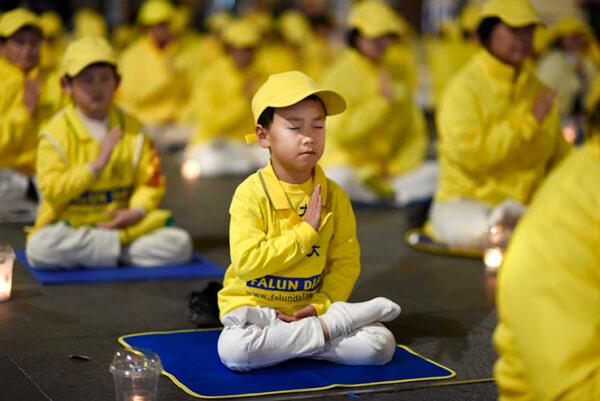 Falun Dafa practitioners commemorate lives lost and 20 years of persecution by the Chinese communist regime in Sydney, Australia, on July 19, 2019. (The Epoch Times)