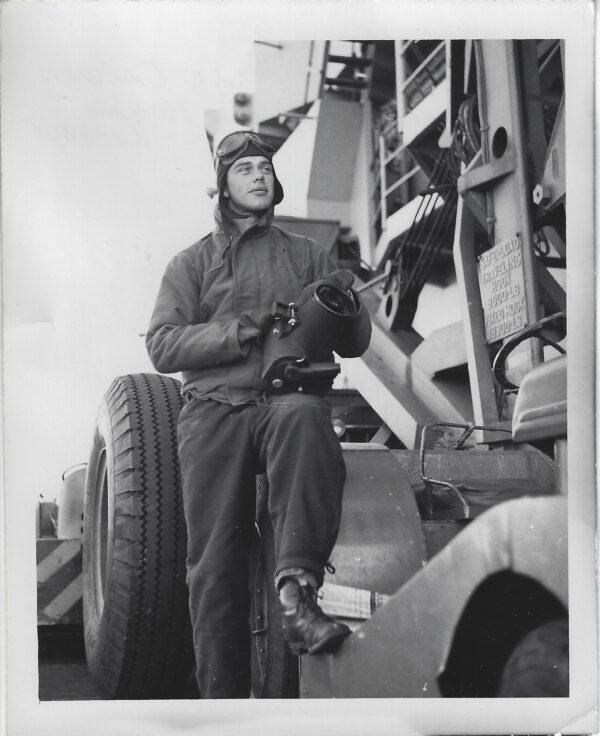 Arthur Moss poses on the USS Bon Homme Richard with his Fairchild K-20 camera. (Courtesy Arthur Moss)