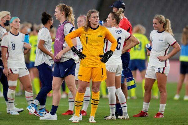 United States' goalkeeper Alyssa Naeher (C) reacts at the end of a women's soccer match against Sweden at the 2020 Summer Olympics, in Tokyo, Japan, on July 21, 2021. (Ricardo Mazalan/AP Photo)