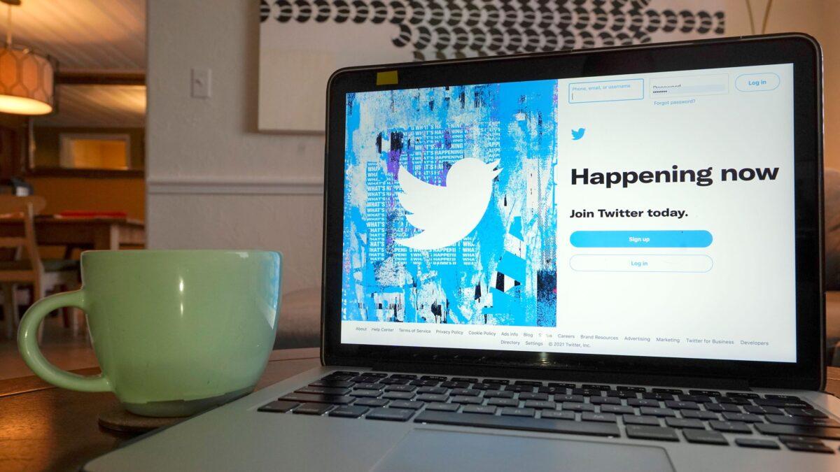 The login or sign-up screen for a Twitter account is seen on a laptop computer in Orlando, Fla., on April 27, 2021. (John Raoux/AP Photo)