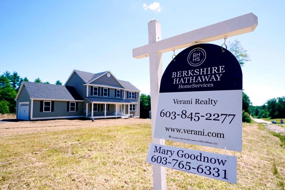 A real estate sign is posted in front of a newly constructed single family home in Auburn, N.H., on June 24, 2021. (Charles Krupa/AP Photo)