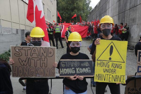 Protesters take part in an anti-extradition rally for Hong Kong in Vancouver on August 17, 2019. (The Canadian Press/Darryl Dyck)